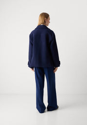 Mid Length Peacock Coat - Presence Hamilton